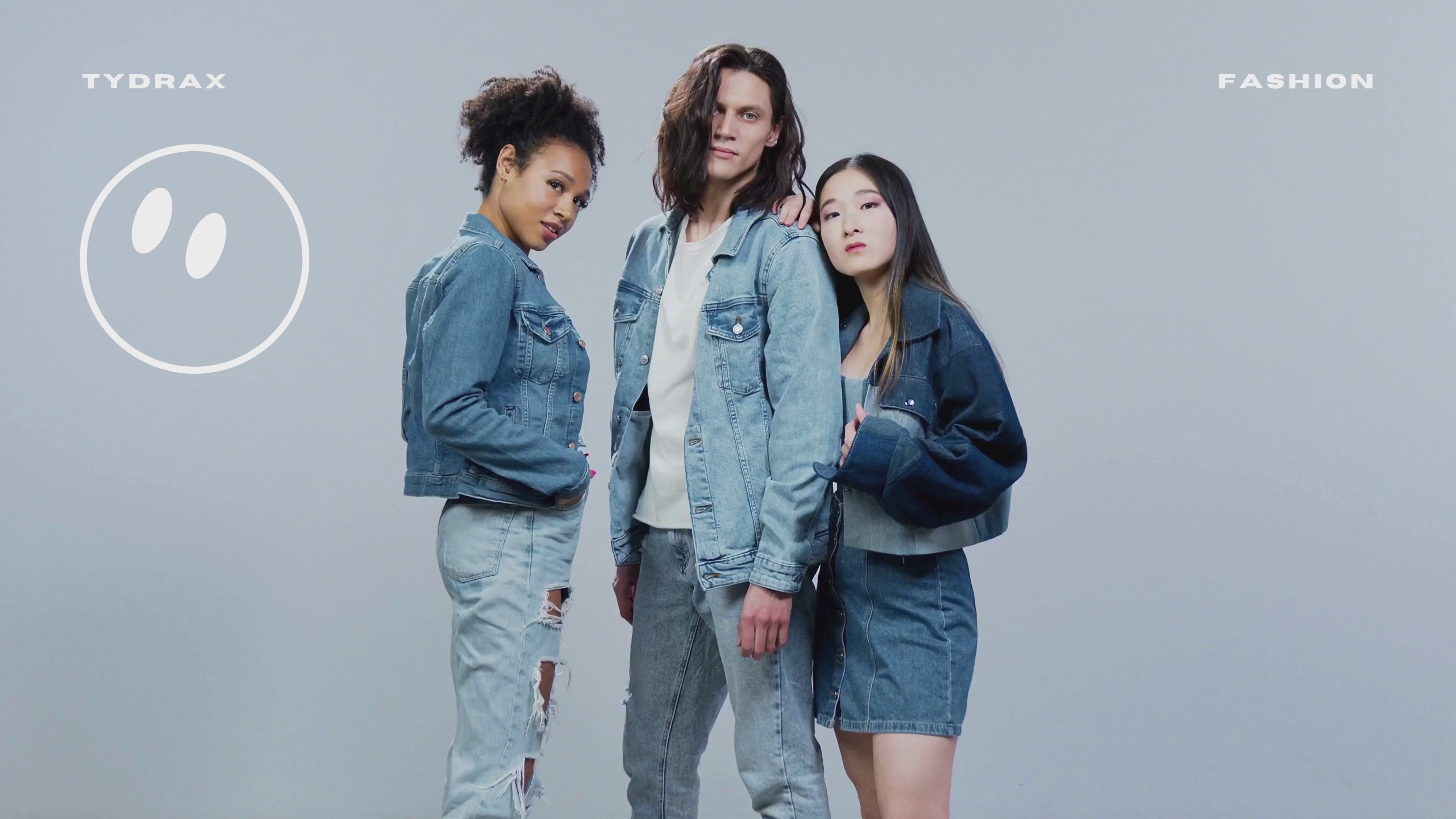 Load video: “Fashion models wearing TYDRAX denim collection showcasing modern style and confidence.”